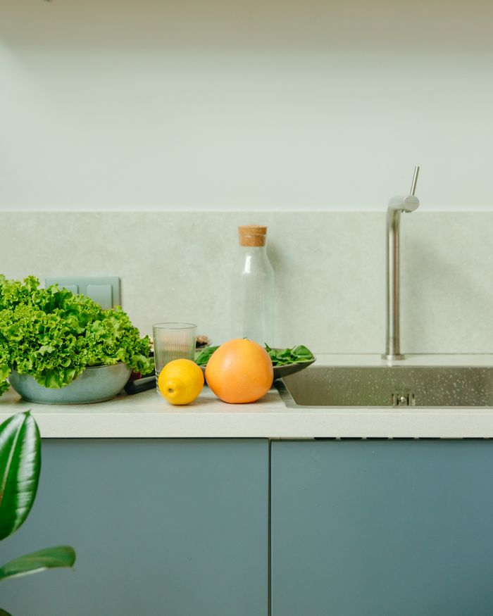 About Organic vegetables and fruits on a kitchen counter promoting healthy living.